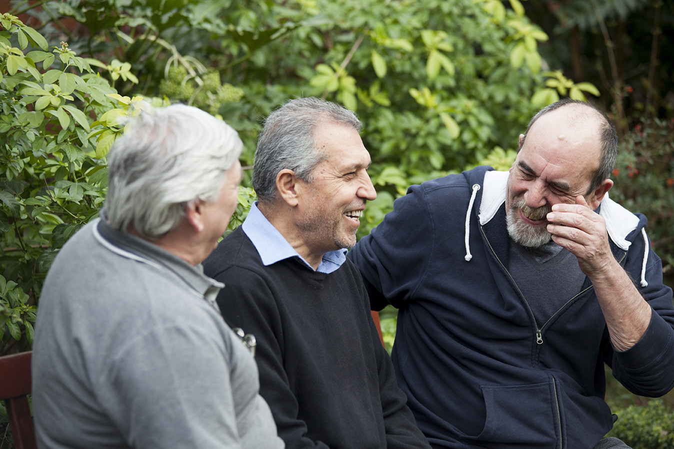 Male carers enjoying making new connections during their National Garden Scheme visit